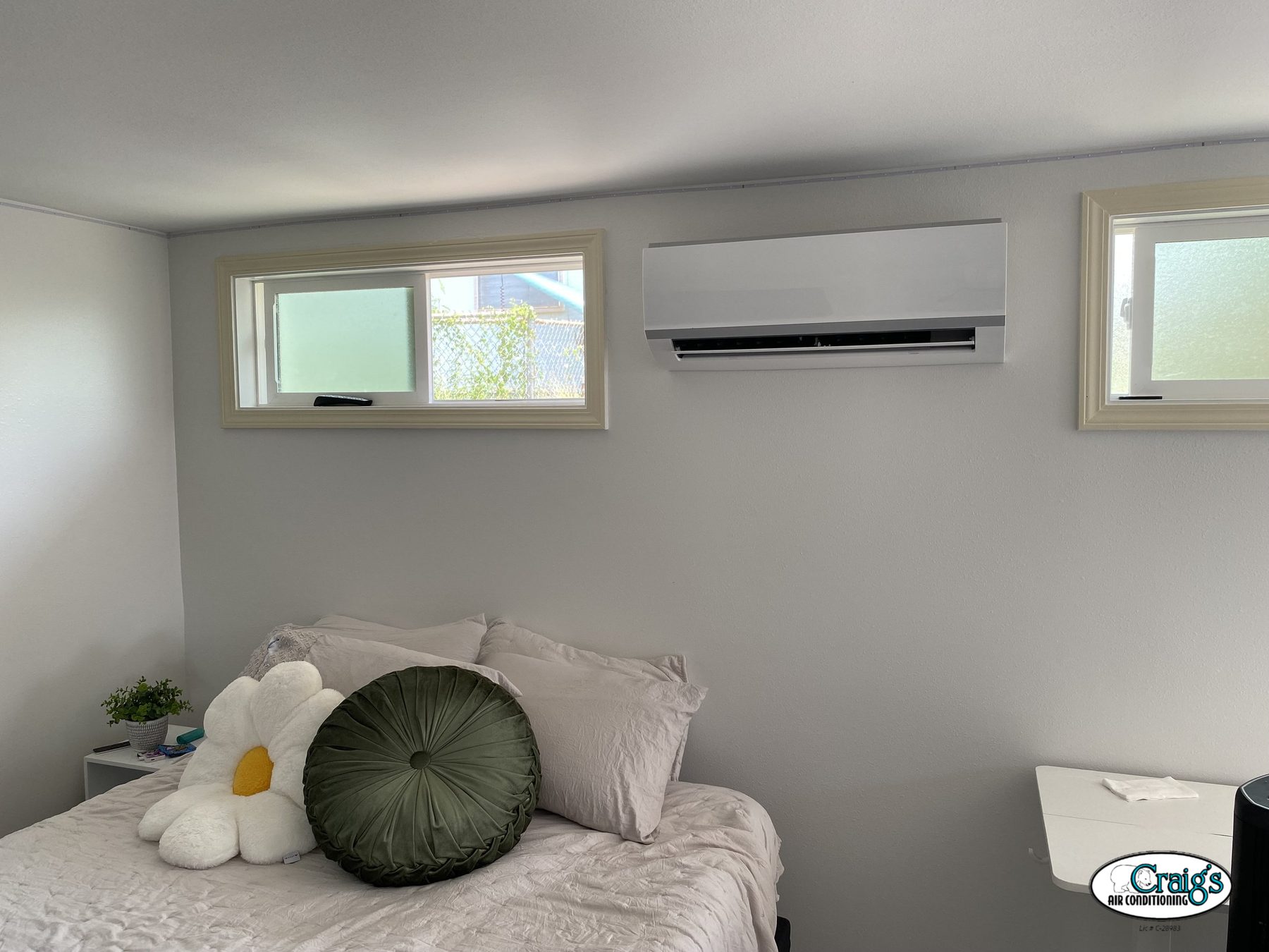 Ductless mini split head installed in a bright residential room