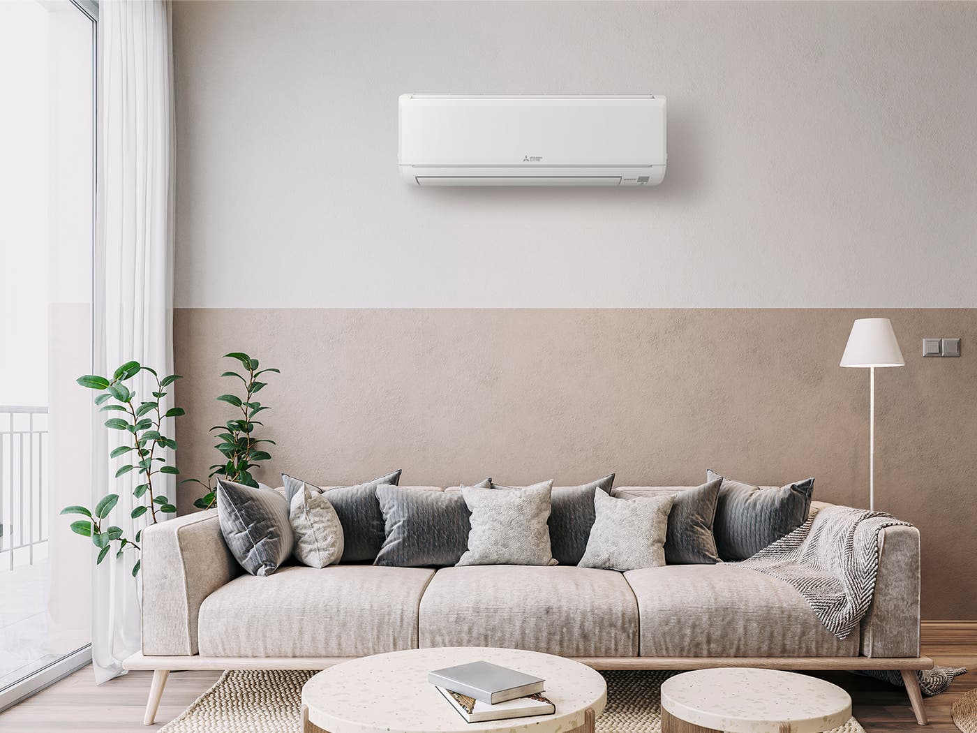 Wall-mounted ductless mini split unit in a bright comfortable living room
